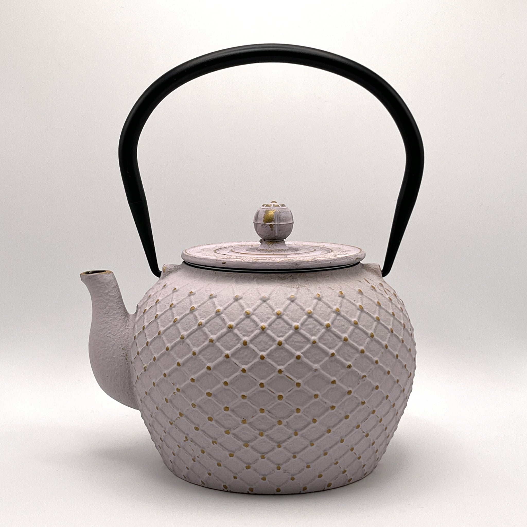 Tetera de hierro fundido rosa Baishan