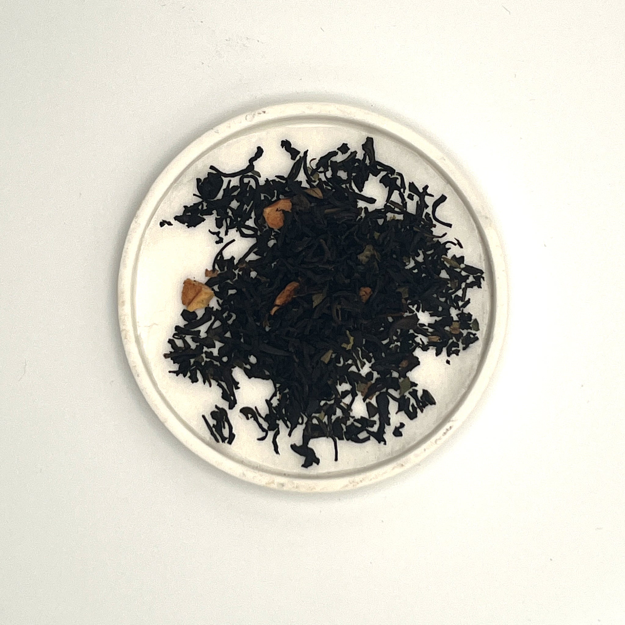 té negro manzana al horno